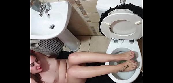  Pissing over feet over the toilet and receiving a foot job and getting my cock sucked